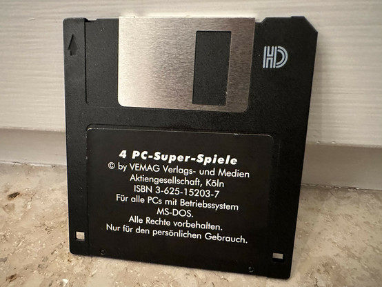 Collection of old DOS games on a 1.44MB floppy disk.