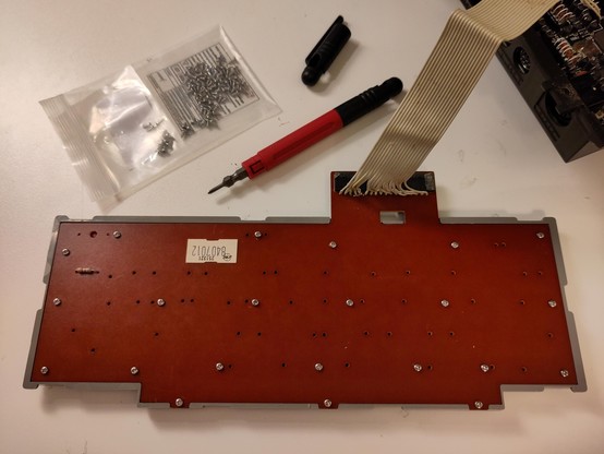 22 tiny M1.7x4 screws got installed and thus the keyboard got converted to one that can be disassembled in the future.