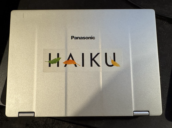 haiku logo sticker on laptop lid