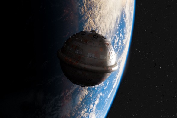 The image shows a large, spherical spacecraft floating above Earth in the vastness of space. The vessel is metallic, with a layered, segmented design, bands of panels, and a slightly wider middle rim that makes it resemble a futuristic space capsule. Its surface has patches of red and gray plating, with circular hatches and structural details scattered across it. Earth dominates the background, partly in shadow, with blue oceans, white clouds, and landmasses visible under sunlight. The curvature of the planet emphasizes the spacecraft’s position in orbit, while the rest of the backdrop is the black emptiness of space.