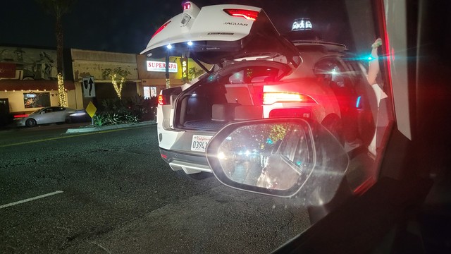 Waymo stopped in traffic lanes