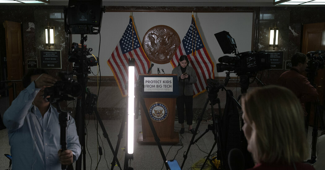 Journalists outside a Senate Judiciary Committee hearing on online child sexual exploitation in January. A new report says A.I. is adding to the problem.